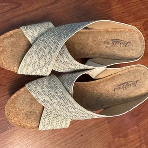 Lucky brand size 9.5 off white wedge sandals. Excellent condition.
